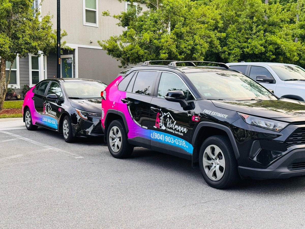Kielmann Cleaning Service branded vehicles in Jacksonville