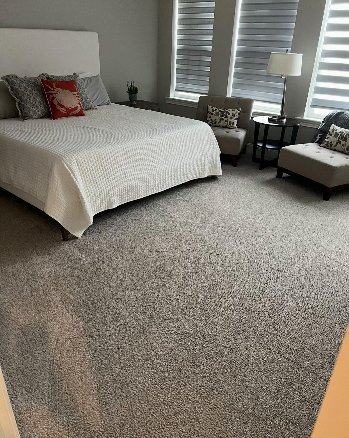 Neatly made bedroom cleaned by Kielmann